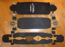 three longboards